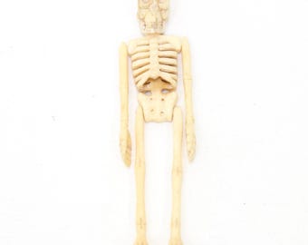 Vintage Memento mori carved bone miniature articulated skeleton prisoner of war style