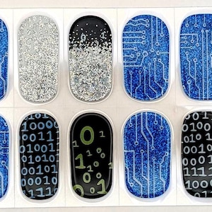 May include: Nail art strips featuring a tech-inspired design. The strips showcase a variety of patterns, including binary code, circuit board designs, and glitter gradients in shades of black, silver, and blue. These nail art strips are perfect for adding a unique touch to your manicure.