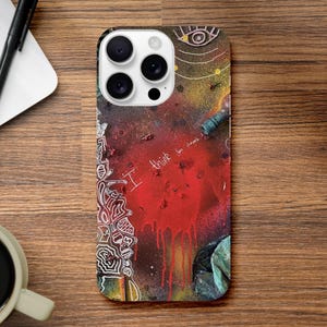 May include: A phone case with a vibrant, artistic design. The case features a red and yellow background with paint drips, graffiti-style drawings, and the text "I think I'm dumb". The case has a glossy finish.