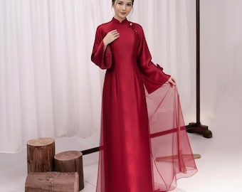 Lujoso traje de boda de seda con estampados de dragones y fénix, ropa tradicional vietnamita, ceremonias de compromiso y ocasiones especiales.