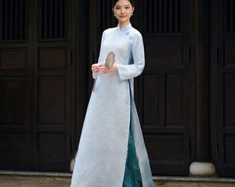 Turquoise Ao Dai butterfly patterns traditional Vietnamese embroidery made from soft silk fabric wedding parties customizable upon request