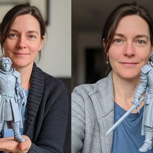 May include: A light gray 3D printed figurine of a warrior dressed in detailed plate armor, featuring a high collar, layered shoulder pauldrons, a chainmail skirt, and a sword held in the right hand. The figure stands upright with a neutral expression.