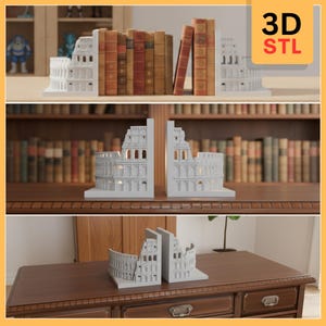 May include: White 3D-printed bookends shaped like the Colosseum. The bookends are displayed on a wooden surface, with books in the background. The text "3D STL" is in the upper right corner.