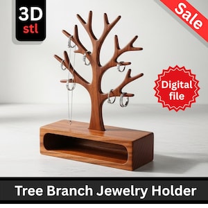 May include: A wooden tree branch jewelry holder with a rectangular base. The tree-shaped display has multiple branches for hanging jewelry. The holder is made of brown wood and is designed to hold rings and necklaces. The text "Tree Branch Jewelry Holder" is at the bottom.