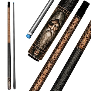 May include: A pool cue featuring a detailed illustration of a bearded, hooded figure with an eyepatch. The shaft is smooth and grey, while the butt section displays intricate brown Celtic knotwork patterns and a textured black grip area.