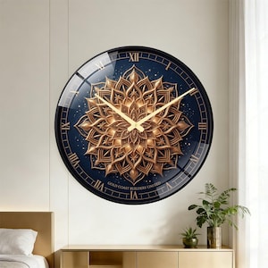 May include: A round wall clock with a black frame and a navy blue face. The clock features gold Roman numerals and hands, and a gold floral design in the center. The text "GOLD COAST BUILDERS LIMITED" is at the bottom.