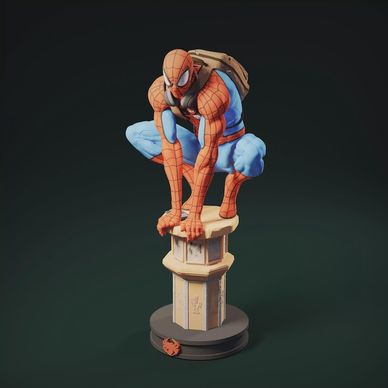 May include: A detailed figurine of Spider-Man in a crouching pose, wearing his signature red and blue suit, with a backpack. The figure is perched atop a decorative, multi-tiered pedestal with a circular base. A small Spider-Man emblem is at the base.