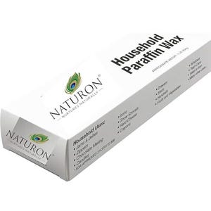 Puede incluir: Una caja blanca de cera de parafina dom&eacute;stica Naturon. La caja presenta un logotipo de pluma de pavo real y texto que indica usos dom&eacute;sticos como para planchas, cremalleras y elaboraci&oacute;n de chocolate. El peso aproximado es de 454 g.