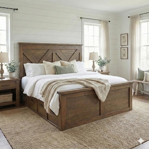 May include: A rustic wooden bed frame with a headboard featuring a cross design. The bed is made up with white bedding, decorative pillows, and a beige throw blanket. The room has a neutral color palette with a woven rug and wooden nightstands.