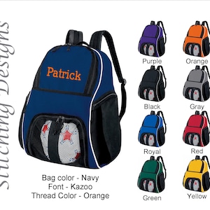 May include: A navy blue backpack with the name "Patrick" embroidered in orange. The backpack has a soccer ball in the front pocket and is shown in multiple colors, including purple, orange, black, gray, royal blue, red, green, and yellow.