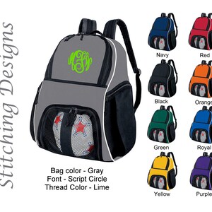 May include: Gray backpack with a lime green monogram. The backpack has a white trim and black mesh pockets. Additional color options include navy, red, black, orange, green, royal, yellow, and purple.