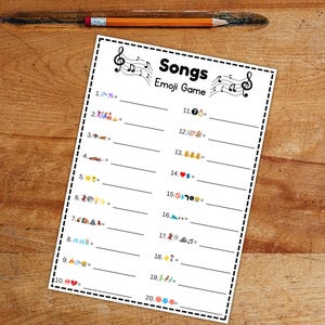 Peut inclure: Une feuille blanche intitul&eacute;e "Songs Emoji Game" avec des notes de musique et 20 lignes d'indices d'&eacute;mojis. Un crayon est pos&eacute; au-dessus sur une surface en bois. Le jeu consiste &agrave; deviner des titres de chansons.