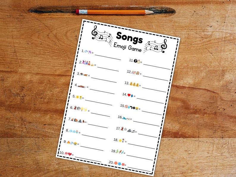 Peut inclure: Une feuille blanche intitul&eacute;e "Songs Emoji Game" avec des notes de musique et 20 lignes d'indices d'&eacute;mojis. Un crayon est pos&eacute; au-dessus sur une surface en bois. Le jeu consiste &agrave; deviner des titres de chansons.