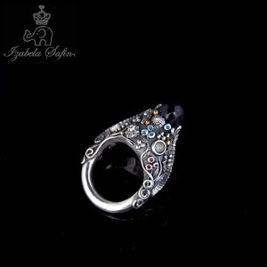 No Ordinary Life Hummingbird Ring with Ametyst and Topas Sky Blue   from Silver 999