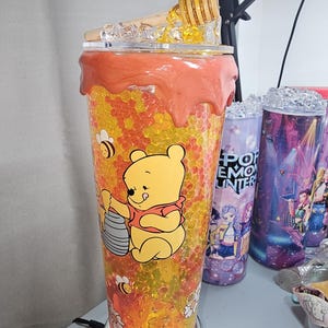 May include: A rustic wooden sign with the text "Welcome to our home" in white lettering. The sign features a distressed finish and a simple, inviting design, perfect for entryway decor.