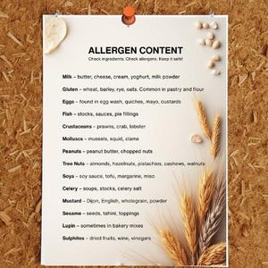 May include: A white paper pinned to a wood-textured surface displays a list of allergen content. The text reads "ALLERGEN CONTENT" followed by a list of potential allergens, including milk, gluten, eggs, fish, crustaceans, and nuts. Wheat stalks and seeds are also visible.