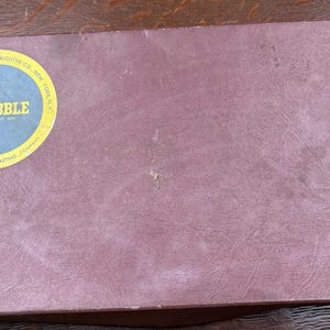 May include: A rustic wooden sign with the text "Welcome to our home" in white lettering. The sign features a distressed finish and a simple, inviting design, perfect for entryway decor.