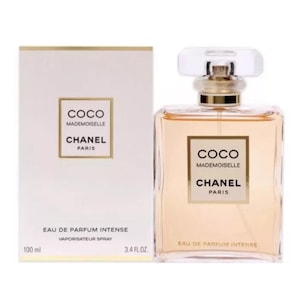 May include: A perfume bottle and box set. The bottle is rectangular with a clear cap and a gold-colored neck. The box and bottle feature the text "COCO MADEMOISELLE CHANEL PARIS" and "EAU DE PARFUM INTENSE". The bottle contains 3.4 fl oz of perfume.