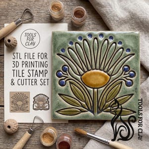 May include: A square, green ceramic tile with a floral design in yellow, blue, and green. The tile is surrounded by pottery tools, including a brush, a loop tool, and small jars of pigment. Text on a card reads "STL FILE FOR 3D PRINTING TILE STAMP & CUTTER SET."