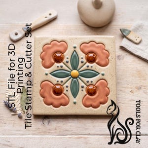 May include: A square, beige tile with a floral design in orange, green, and brown. The tile has a speckled texture and is surrounded by tools and a ceramic piece. Text on the left reads "STL File for 3D Printing Tile Stamp & Cutter Set."