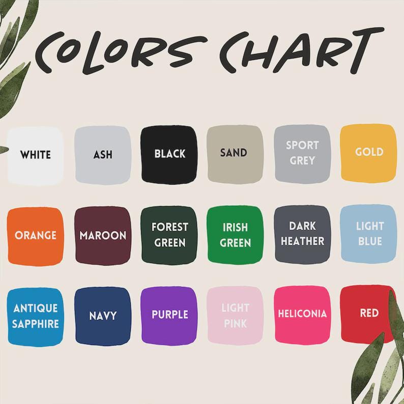 Op de afbeelding: Een kleurenkaart met de tekst COLORS CHART bovenaan en vijftien afgeronde vierkanten met verschillende kleuren, gelabeld white, ash, black, sand, sport grey, gold, orange, maroon, forest green, irish green, dark heather, light blue, antique sapphire, navy, purple, light pink, heliconia en red.