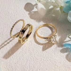 Conjunto de anillo de compromiso de moissanita marquesa de 2 quilates, conjunto nupcial celestial de plata 925, banda grabada con estrella, anillo de tres piedras en racimo, conjunto de boda