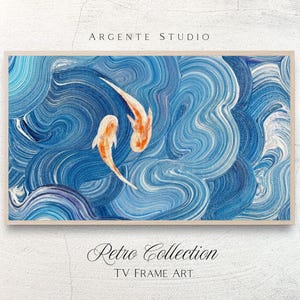 May include: A framed art print featuring two orange koi fish swimming in a sea of blue and white swirling brushstrokes. The artwork is labeled "Retro Collection" and "TV Frame Art" with the studio name "ARGENTE STUDIO" at the top.