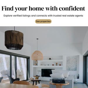 May include: Interior shot of a modern living room with large windows and natural light. The room features woven pendant lights, a neutral color palette, and the text "Find your home with confident".