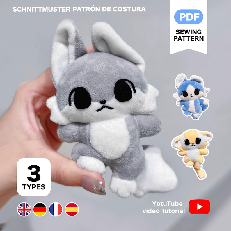 K&ouml;nnte beinhalten: Ein Pl&uuml;schtier in Form eines grau-wei&szlig;en Hasen mit gro&szlig;en schwarzen Augen und einem kleinen Mund. Das Bild zeigt auch zwei weitere Pl&uuml;schtiere, ein blau-wei&szlig;es und ein gelb-wei&szlig;es. Der Text auf dem Bild lautet "PDF Sewing Pattern".