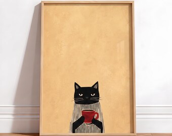 以下が含まれることがあります： 赤いマグカップを持った黒猫が描かれた、額入りのアートプリント。猫はベージュの背景にストライプのセーターを着ています。フレームは明るい色の木材で作られています。