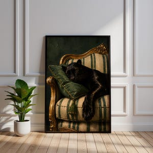 May include: A framed wall art print depicting a black panther resting on a striped armchair with a green velvet pillow. The chair features ornate gold carved wood detailing. The panther is positioned with its head on the pillow and one paw hanging over the edge of the seat cushion, set against a dark green background.