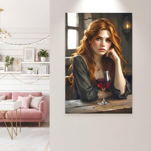 May include: Digital art print depicting a woman with flowing red hair, wearing a dark green dress, seated at a wooden table with a glass of red wine. The artwork is mounted on a white wall, with a hint of a living room visible.