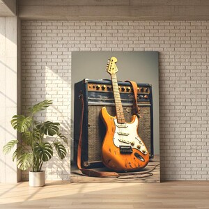 May include: An orange electric guitar with a white pickguard and a brown leather strap rests against a vintage amplifier. The guitar has visible wear and tear, suggesting it's well-used. The amplifier is black with a woven speaker cover.
