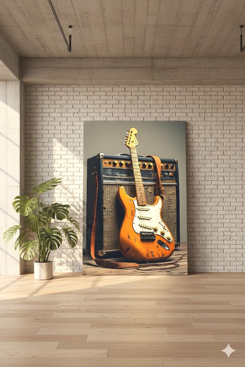 May include: An orange electric guitar with a white pickguard and a brown leather strap rests against a vintage amplifier. The guitar has visible wear and tear, suggesting it's well-used. The amplifier is black with a woven speaker cover.
