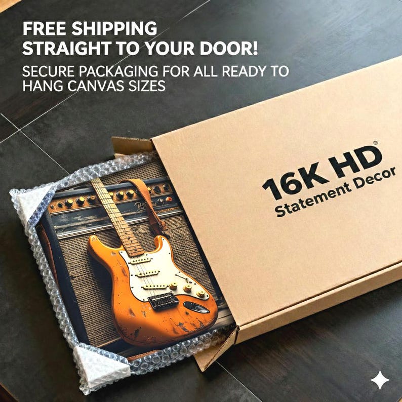 May include: An orange electric guitar with a white pickguard and brown strap is visible inside a cardboard box. The box is labeled "16K HD Statement Decor." The image is packaged with bubble wrap. Text on the box reads "FREE SHIPPING STRAIGHT TO YOUR DOOR!"