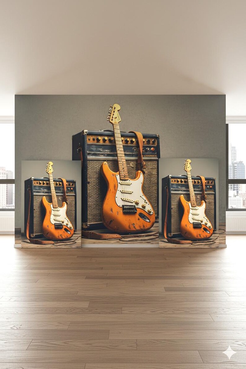 May include: Three orange electric guitars with white pickguards and brown leather straps are displayed in front of black amplifiers. The guitars are set against a gray backdrop, with a wooden floor in the foreground.