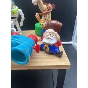 Lote vintage de 15 figuras Disney de Toy Story: Buzz, Woody, binoculares, Scud, Stinky Pete. imagen 6