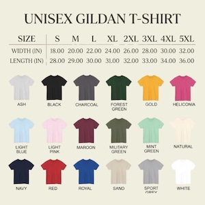 May include: A chart displaying a variety of Gildan unisex t-shirts in various colors, including ash, black, charcoal, forest green, gold, and heliconia. The chart also shows the size and measurements in inches for each shirt.