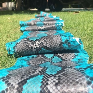 May include: A set of three ceramic mugs with a speckled, matte finish. The mugs are in shades of cream, light gray, and dark gray. Each mug has a simple, minimalist design, perfect for coffee or tea.