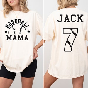 Ivory Comfort Colors Shirt with a Retro Mama baseball design and name and number on the back custom baseball mama shirt