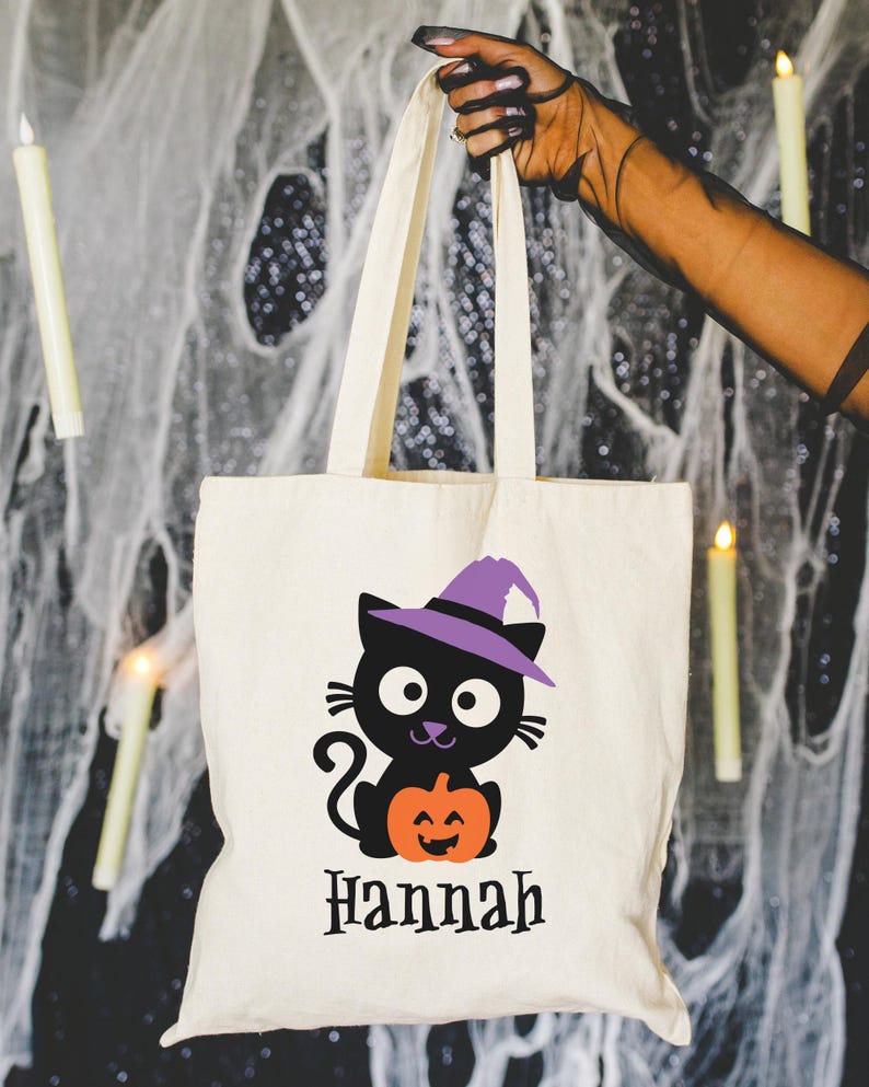 Halloween Trick or Treat tote bag with a cute black cat wearing purple hat and a pumpkin, personalized with kids name is perfect for Trick or treating or Halloween gift