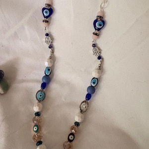 Evil eye protection glasses string