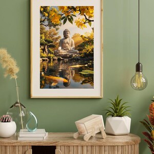 May include: A framed print depicts a serene Buddha statue seated in a tranquil pond, surrounded by lush greenery and yellow flowers. The artwork features a koi fish and a bird, creating a peaceful, nature-inspired scene. The frame is a light wood color.