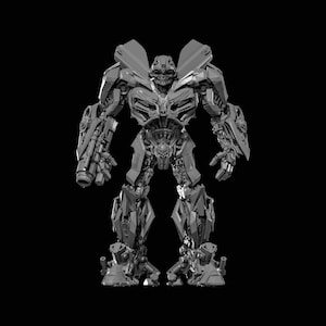 May include: A grayscale 3D model of a robot with intricate mechanical details. The robot has a humanoid form with large shoulders, a detailed chest, and weapon-like attachments on its arms. The figure stands against a black background, highlighting its metallic texture.