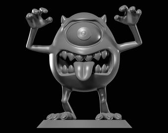 May include: A gray, cartoonish monster figurine with one large eye, a wide open mouth, and a long tongue. The monster has arms raised in a gesture of fright and is standing on a rectangular base. The background is black.