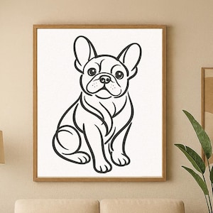 May include: A framed black and white line art print of a French Bulldog. The artwork features a minimalist design of the dog in a sitting position. The print is displayed above a beige sofa in a living room setting.