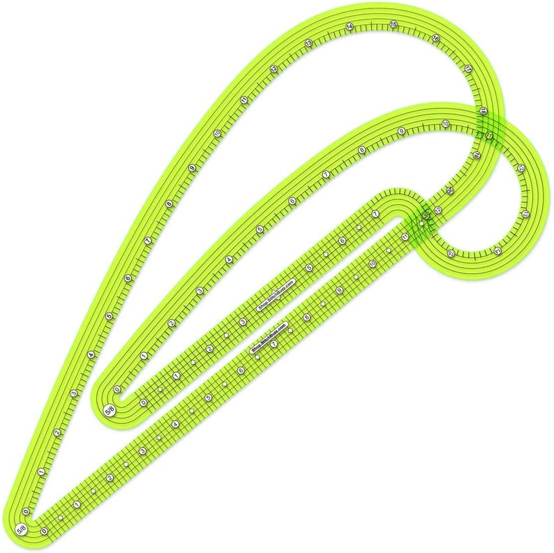 May include: A green plastic sewing template with two curved rulers and a grid pattern. The template is designed for creating curved shapes and has markings in inches.