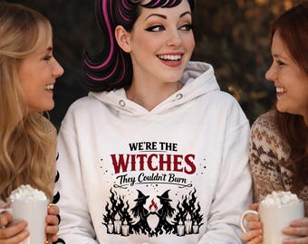 Heksen die niet kunnen branden hoodie - krachtige grafische hoodie met mouwversiering