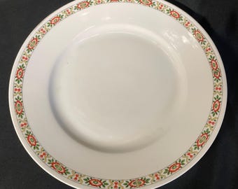 A vintage porcelain dinner plate from the Victoria factory located in Altrohlau (modern-day Stará Role, Czech Republic).