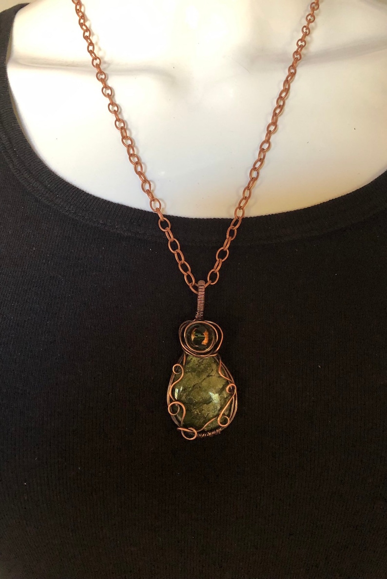 wire wrapped green serpentine gemstone in antique copper pendant necklace